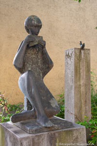 Junge mit Panflöte