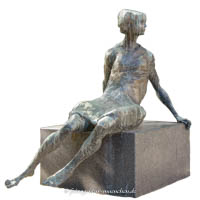 Sitzende Frau